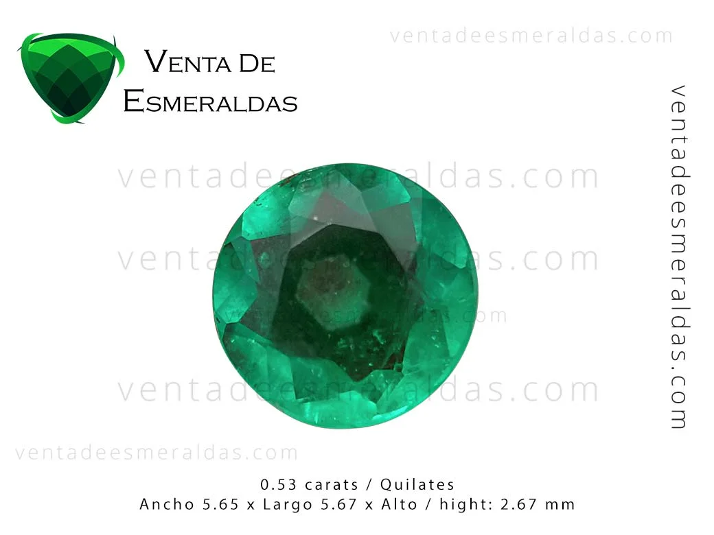 esmeralda colombiana redonda con una canutillo en el centro