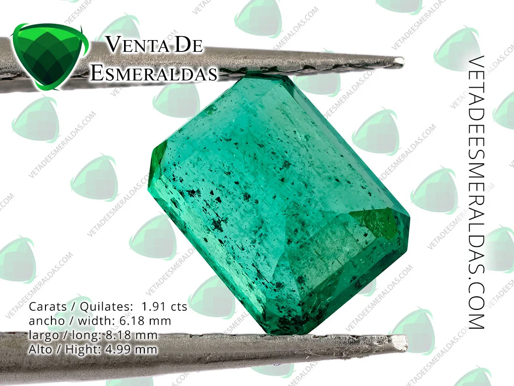 esmeralda colombiana de muzo con inclusiones y carbones