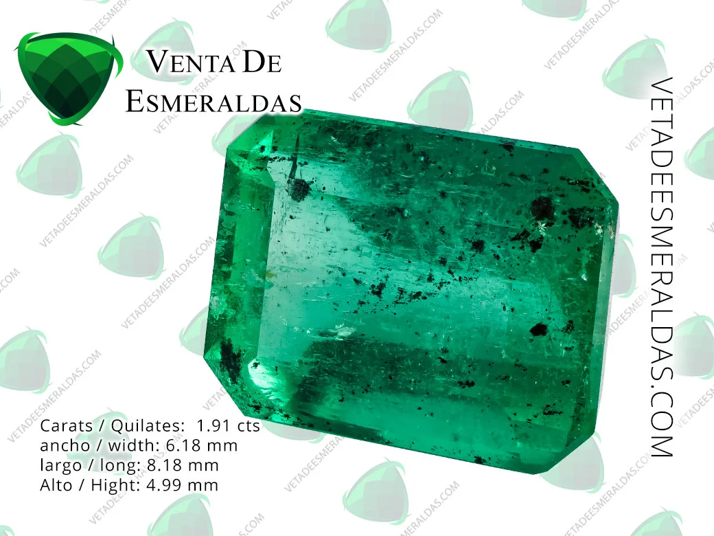 esmeralda colombiana de muzo con inclusiones y carbones